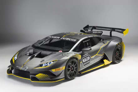 HD desktop wallpaper featuring a sleek, silver Lamborghini Huracan race car, highlighting its aerodynamic design and racing decals.