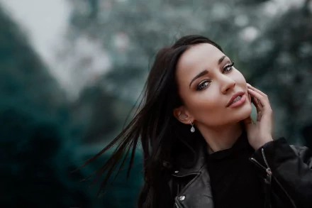 Portrait of brunette model Angelina Petrova with a blurred natural background, showcasing depth of field in this HD PC desktop wallpaper and background.