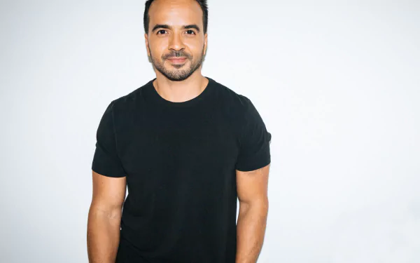 HD desktop wallpaper featuring a man in a black T-shirt, providing a clean and focused background.