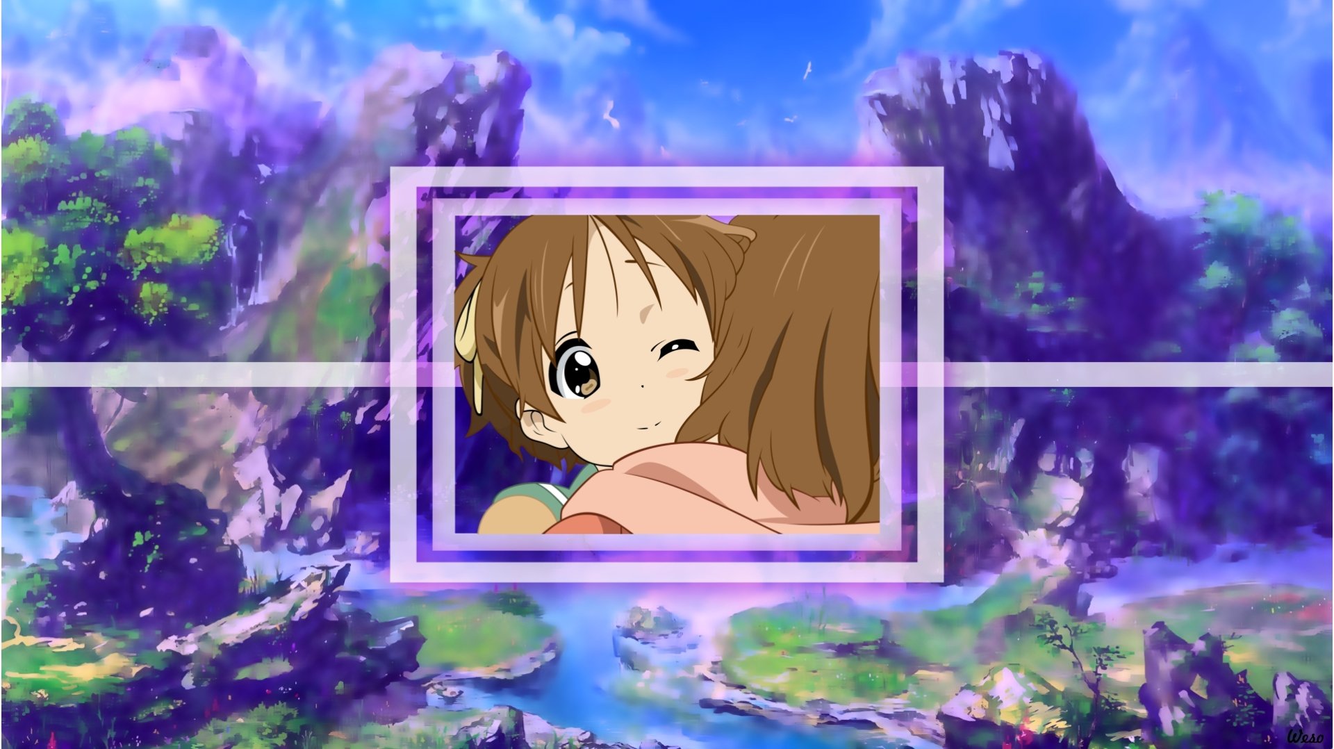 HD PC desktop wallpaper featuring anime K-ON! characters Yui Hirasawa and Ui Hirasawa sharing a warm hug in a framed inset against a vivid, colorful fantasy landscape background.