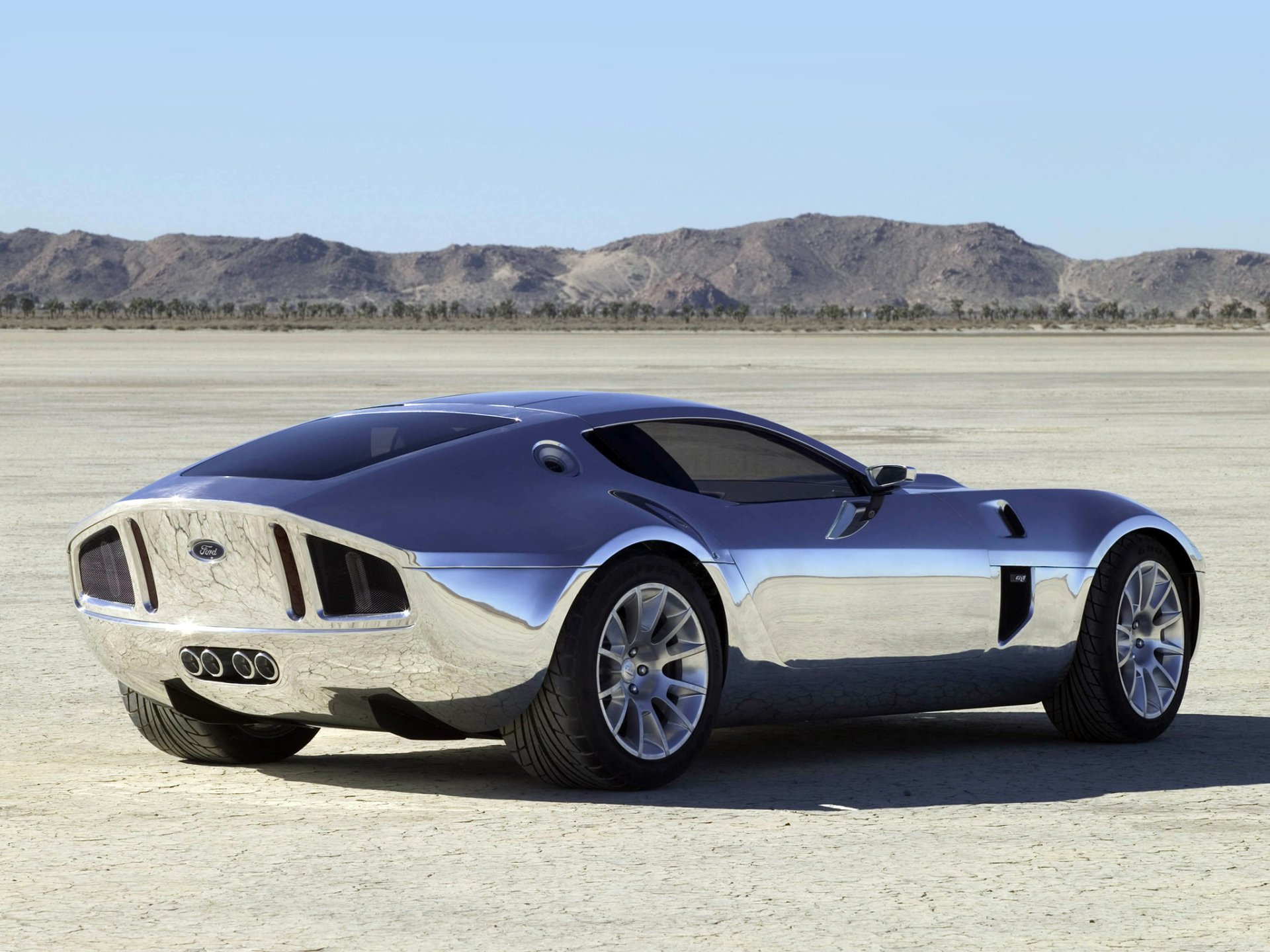 Chrome Ford Shelby GR-1 concept car on a dry salt flat — sleek Ford vehicle, HD PC desktop wallpaper background.