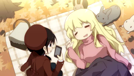 Anime-style HD desktop wallpaper featuring Chito and Yuuri from Girls' Last Tour resting on a blanket surrounded by plush rabbits in a warm, autumn setting.