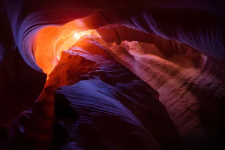 HD desktop wallpaper showcasing the vivid orange and purple hues of Antelope Canyon's natural rock formations in a stunning nature canyon scene.