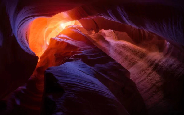 HD desktop wallpaper showcasing the vivid orange and purple hues of Antelope Canyon's natural rock formations in a stunning nature canyon scene.