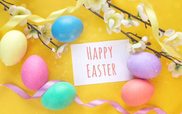 Brightly colored Easter eggs and spring blossoms surround a Happy Easter card, set against a vibrant yellow background in this HD PC desktop wallpaper.