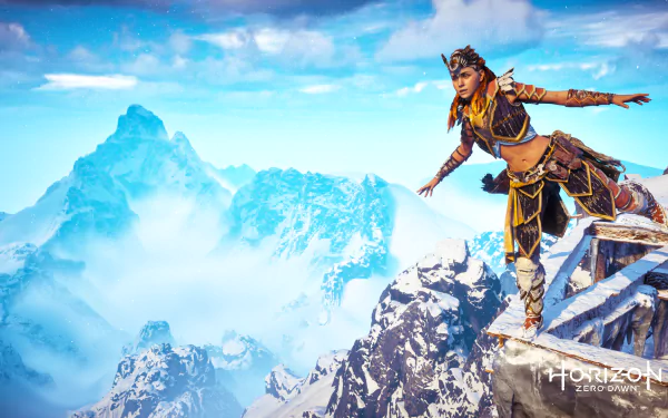 Aloy from Horizon Zero Dawn: The Frozen Wilds balances on a snowy mountain ledge against a vivid blue sky, captured in this HD PC desktop wallpaper.