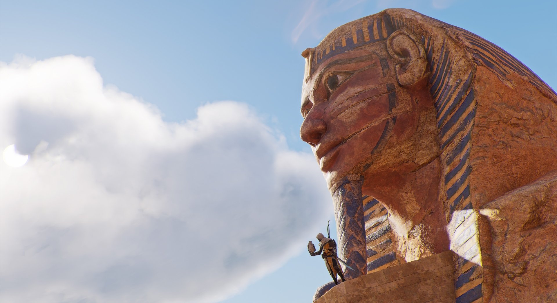 HD PC desktop wallpaper featuring Bayek of Siwa standing near the ancient Egyptian Sphinx from the video game Assassin's Creed Origins.