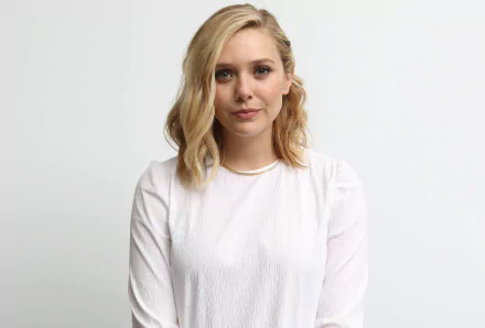 HD PC desktop wallpaper featuring a clear, high-quality portrait of celebrity Elizabeth Olsen in a white top against a plain background.