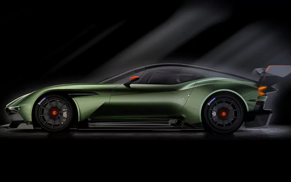 Sleek green Aston Martin Vulcan hypercar race car in dynamic lighting, captured in ultra-high-definition for a striking 4K PC desktop wallpaper.