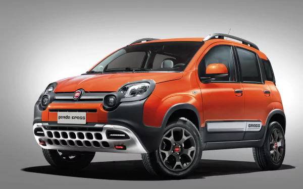 HD wallpaper featuring an orange Fiat Panda Cross SUV, showcasing its rugged design and compact vehicle style against a neutral background.