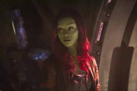 Zoe Saldana as Gamora in a scene from Avengers: Infinity War, showcasing her iconic green complexion and vibrant red hair in stunning 4K Ultra HD quality.