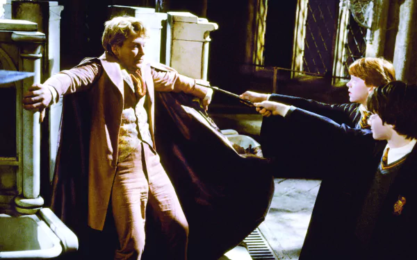 HD desktop wallpaper from Harry Potter and the Chamber of Secrets: Gilderoy Lockhart confronted by Ron Weasley and Harry Potter, wands raised in a shadowy castle corridor.