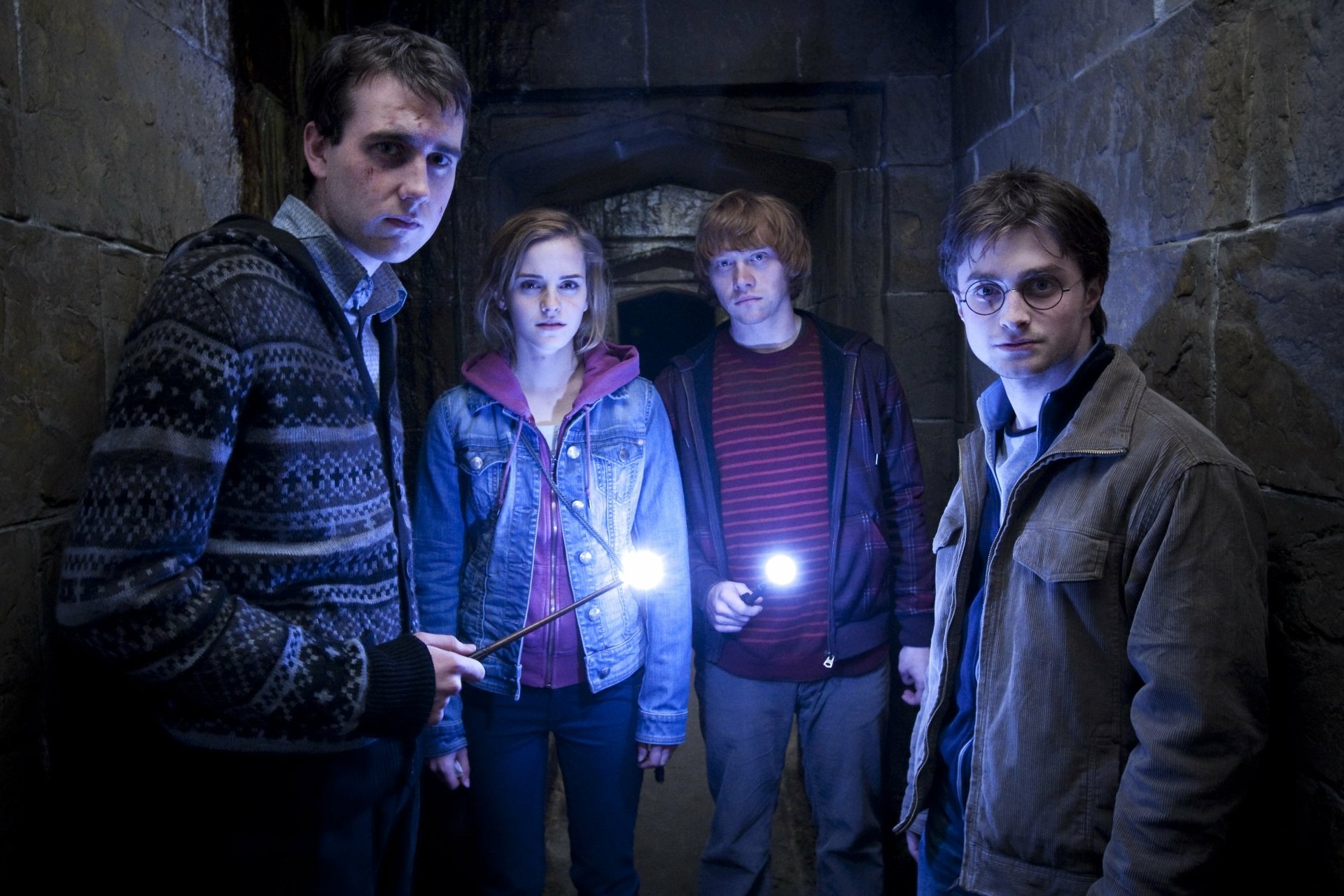 HD PC desktop wallpaper featuring Hermione Granger, Ron Weasley, Harry Potter, and Neville Longbottom from the movie Harry Potter and the Deathly Hallows: Part 2.