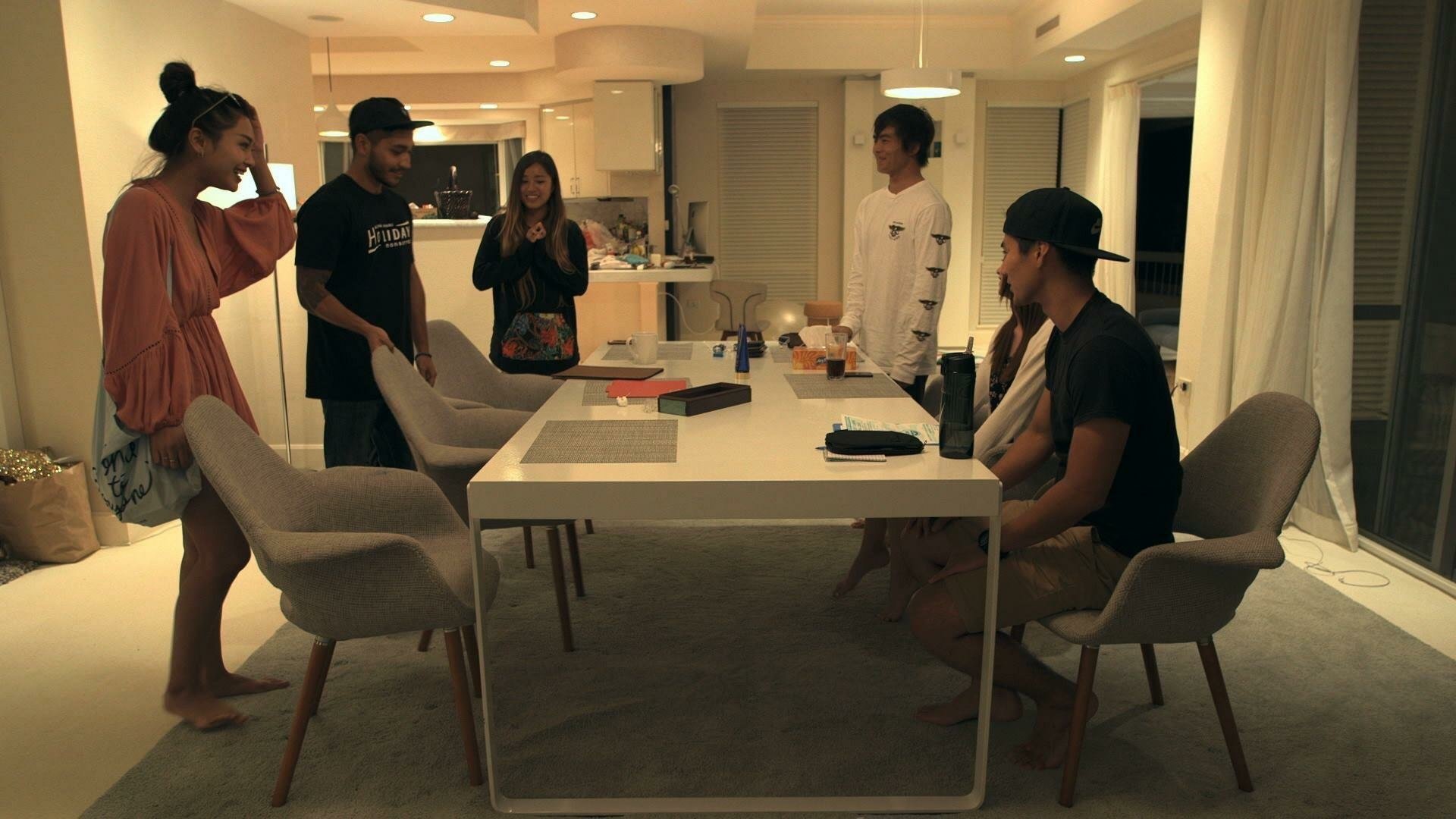 HD desktop wallpaper of a Terrace House scene with members in a cozy evening living room setting.