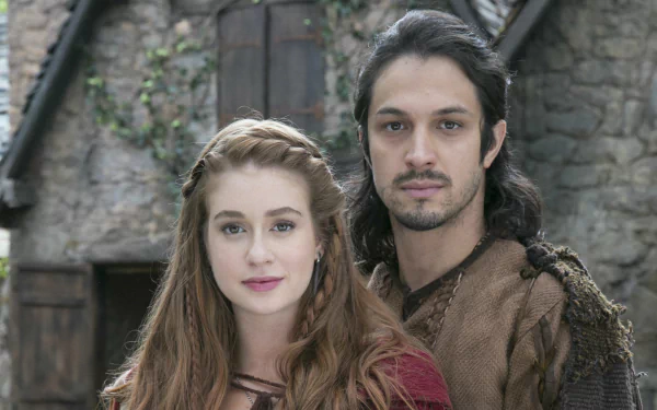 A captivating HD wallpaper featuring characters from the TV show Deus Salve o Rei, set against a rustic background, highlighting their timeless bond and regal aura.