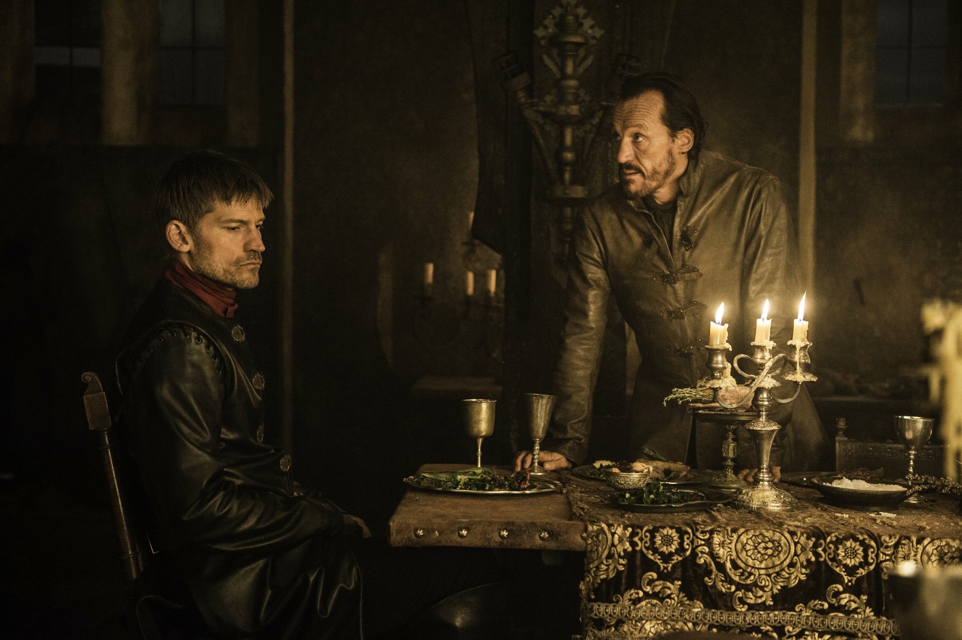 Jerome Flynn as Bronn and Nikolaj Coster-Waldau as Jaime Lannister in a dimly lit Game of Thrones scene, captured in 4K Ultra HD for PC desktop background.