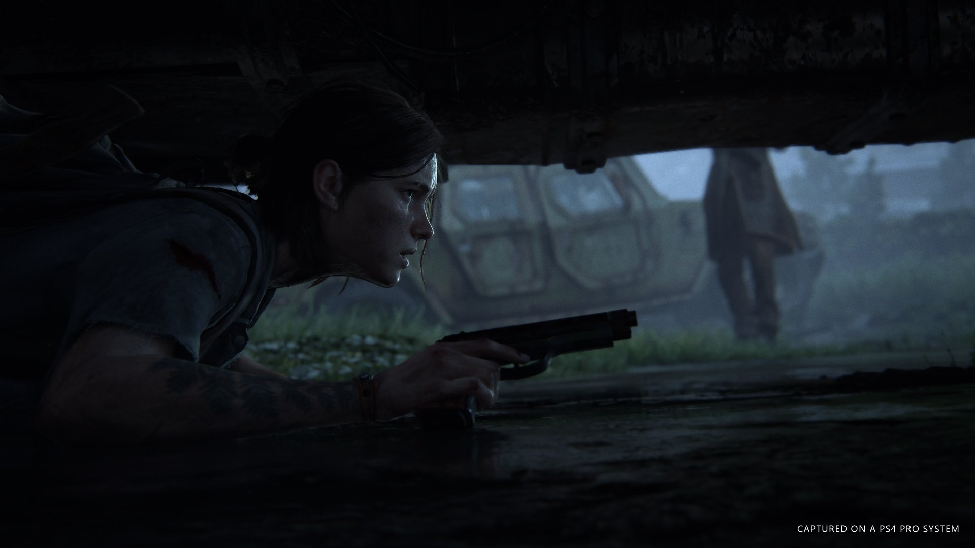 Ellie from The Last of Us Part II crouches with a pistol in a dark, misty environment, showcased in this 4K Ultra HD PC desktop wallpaper from the video game.