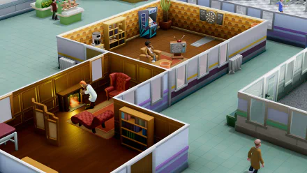 HD desktop wallpaper of Two Point Hospital showing in-game hospital layout with characters and various rooms.