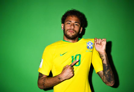 Brazilian soccer star Neymar in a vibrant yellow jersey with number 10, set against a bright green background. 4K Ultra HD PC desktop wallpaper and sports image.