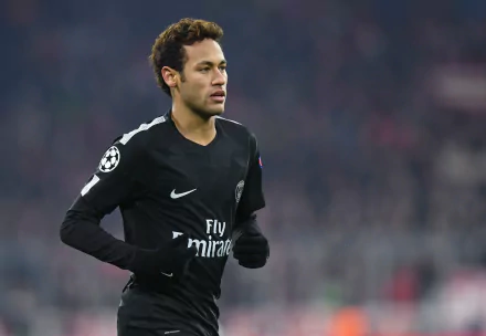 4K Ultra HD wallpaper of Brazilian soccer star Neymar in action, showcasing his focus and skill on the field.
