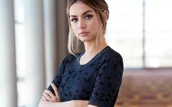 Cuban actress and model Ana de Armas with brunette hair poses confidently indoors in this 4K Ultra HD PC desktop wallpaper and background.