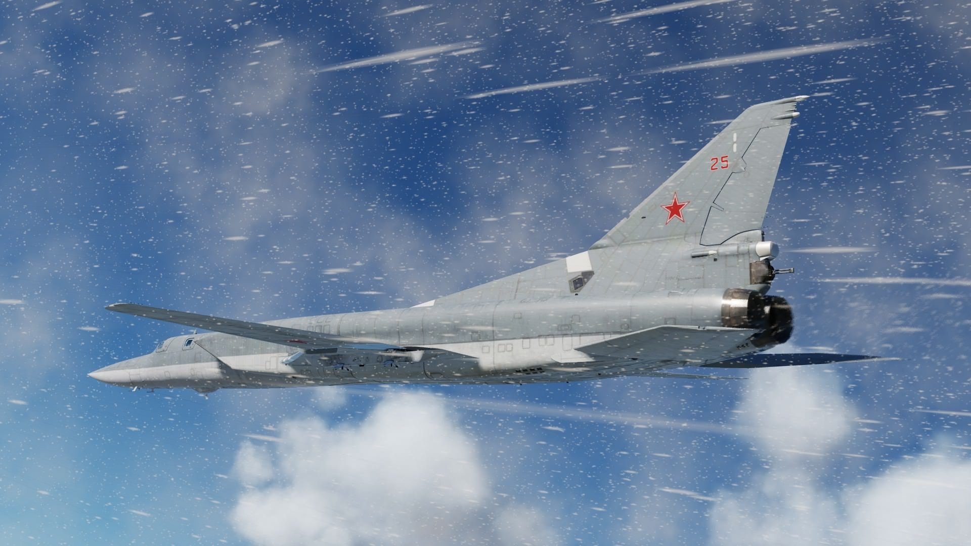 HD desktop wallpaper featuring a Tupolev Tu-22 military bomber aircraft flying through a partly cloudy sky.