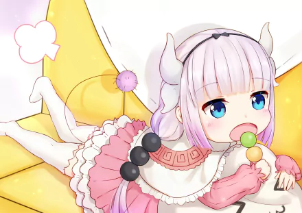 HD PC desktop wallpaper of Kanna Kamui (Miss Kobayashi's Dragon Maid) reclining on a yellow cushion, pastel colors, big blue eyes and holding a three-colored dango lollipop.