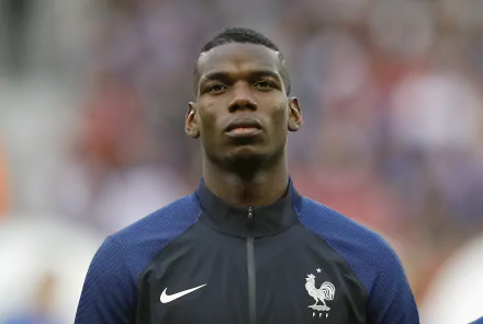 HD desktop wallpaper featuring a portrait of a sports player in a blue jersey with a Nike logo and the French national team emblem.