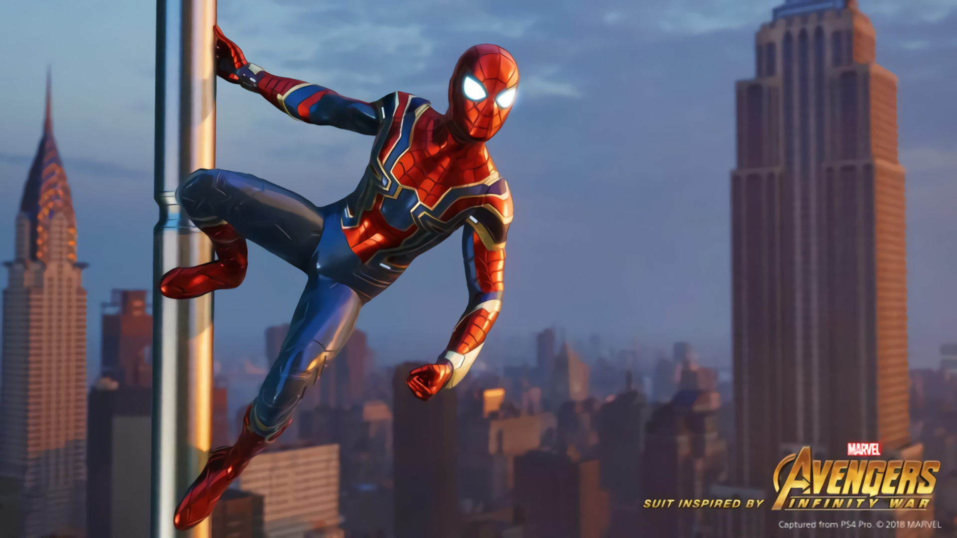 HD PC desktop wallpaper featuring Spider-Man from the Spider-Man (PS4) video game, swinging through a cityscape with tall buildings in the background.