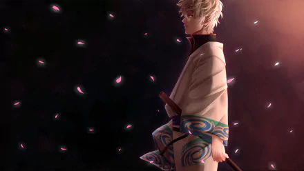 HD PC desktop wallpaper featuring Gintoki Sakata from the anime Gintama, surrounded by floating petals against a dark background with soft lighting.