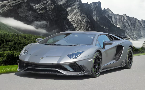 Silver Lamborghini Aventador S supercar parked on a mountain road, captured in stunning 4K Ultra HD as a dynamic PC desktop wallpaper.