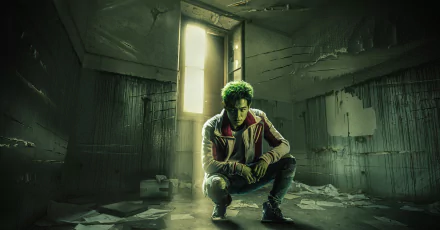 Ryan Potter as Garfield Logan (Beast Boy) from the TV show Titans, featured in a dark, abandoned room with light streaming through a doorway, HD desktop wallpaper.