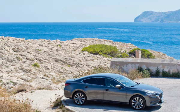 Silver Mazda 6 sedan, high definition desktop wallpaper, featuring sleek vehicle design, perfect for automotive enthusiasts and Mazda fans.