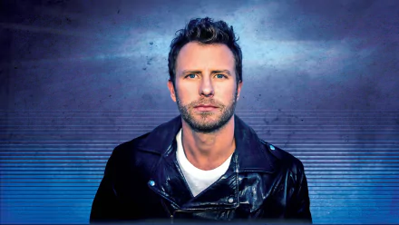 Dierks Bentley stands confidently in a leather jacket against a cool blue backdrop, capturing the essence of music in this HD desktop wallpaper.