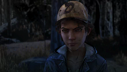 Clementine (The Walking Dead: The Final Season) gazes sternly in a dark forest — HD PC desktop wallpaper/background artwork from the video game.