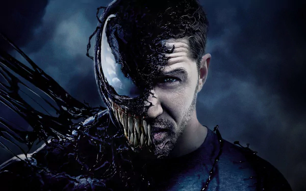 HD PC desktop wallpaper featuring Tom Hardy as Venom, with half his face transformed into the iconic symbiote from the movie Venom.