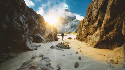 A fantasy-themed 4K Ultra HD PC desktop wallpaper featuring a lone figure walking on a sandy path between rocky cliffs toward a glowing, dreamlike mountain peak.