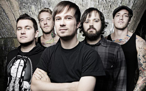 HD desktop wallpaper featuring the band Funeral for a Friend posed against a textured background.