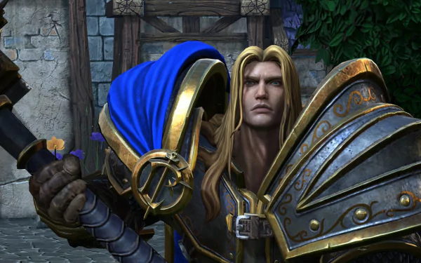 HD wallpaper of Arthas Menethil from Warcraft III: Reforged, featuring the character in armor with a blue cloak.