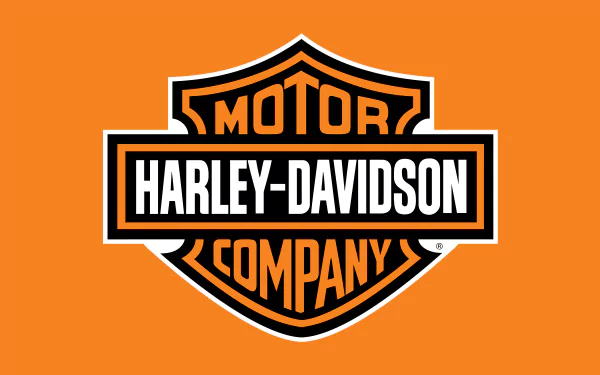 Harley-Davidson logo on an orange background, designed as a desktop wallpaper and background.