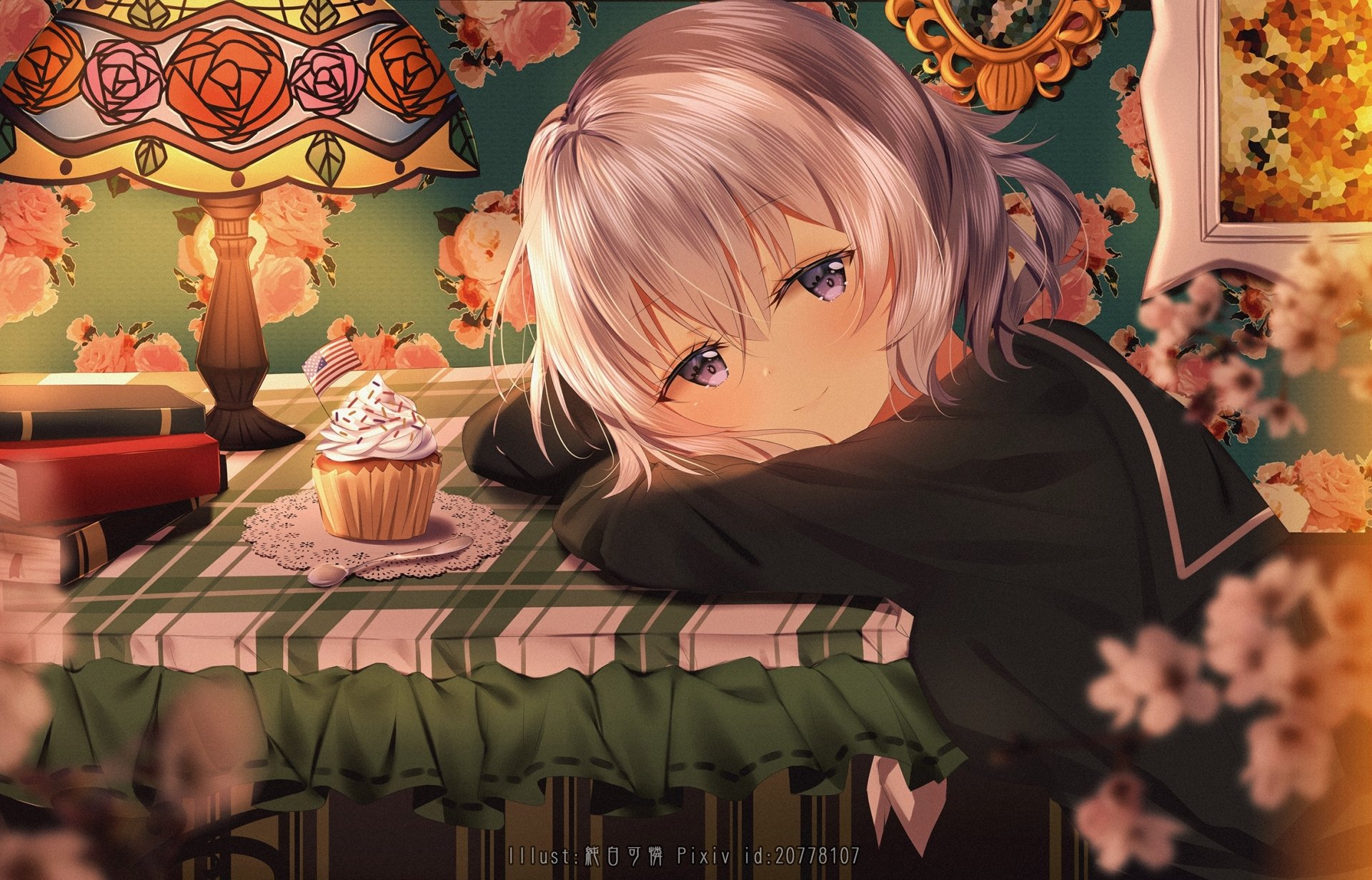 HD desktop wallpaper featuring Junko Konno from Zombie Land Saga anime. Junko is resting her head on a table adorned with a cupcake, books, and a floral lamp, set against a vibrant, patterned background.