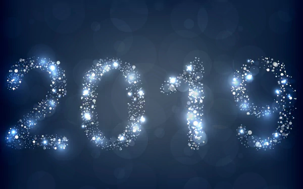 A sparkling 2019 New Year design with glowing, star-like lights on a dark blue background, featured as a 4K Ultra HD PC desktop wallpaper for the holiday season.