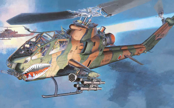 HD PC desktop wallpaper of a camouflaged Bell AH-1 Cobra military attack helicopter in flight, armed with rockets and shark-mouth nose art.