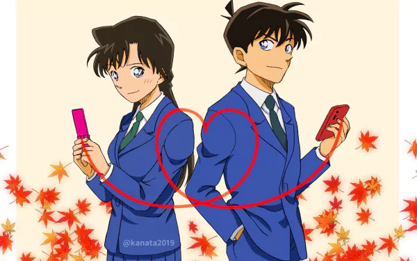 HD anime desktop wallpaper featuring Mouri Ran and Shinichi Kudo from Detective Conan, standing back-to-back with autumn leaves scattered around.