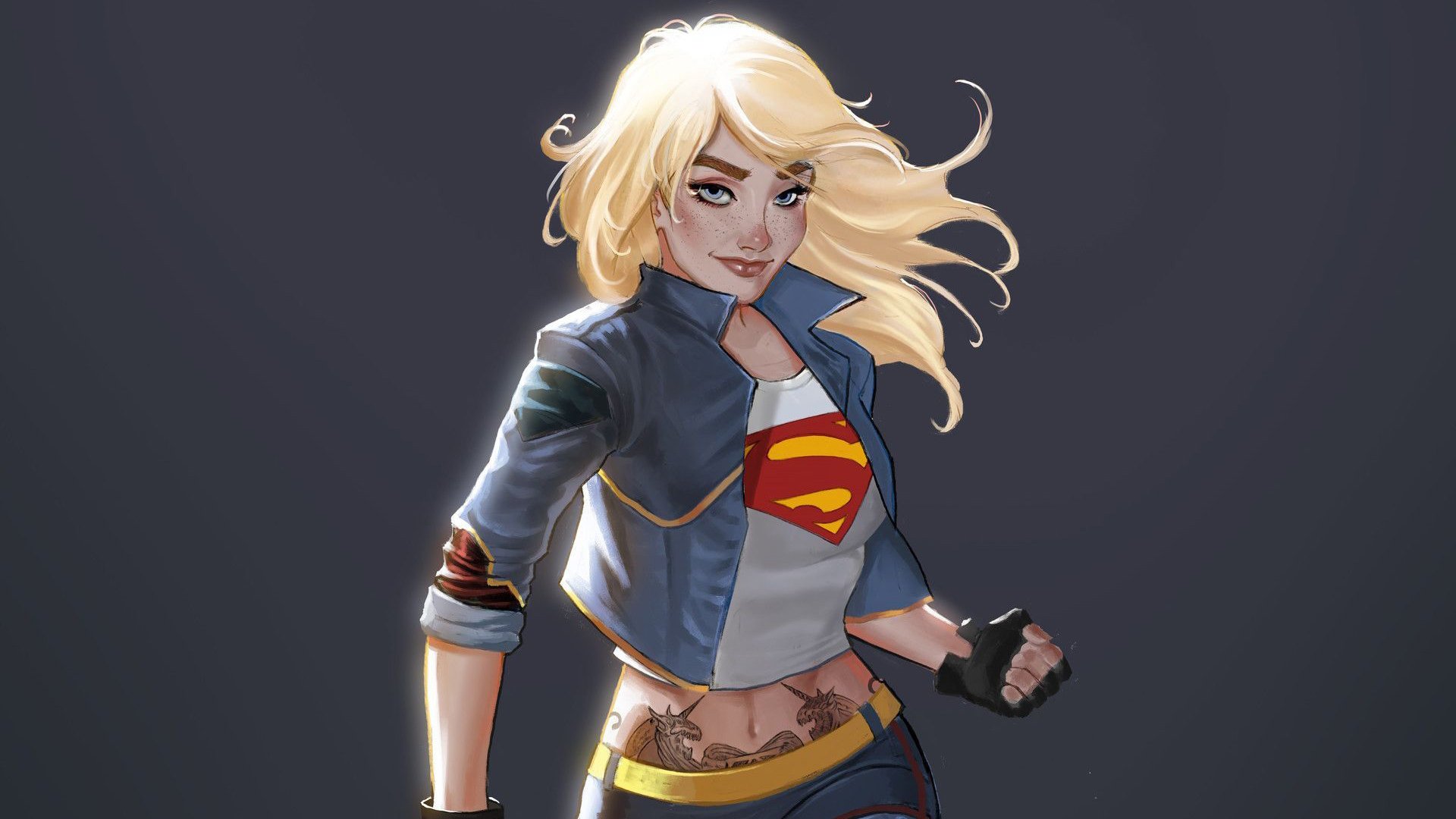 HD desktop wallpaper featuring Kara Zor-El with blonde hair in a modern Supergirl outfit from DC Comics, showcasing a confident and dynamic comic-style pose.