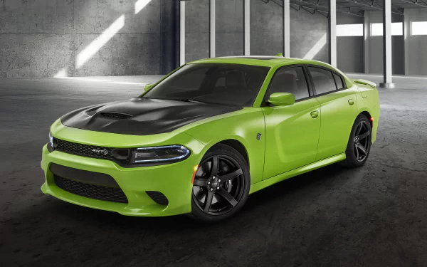 A vibrant green Dodge Charger SRT muscle car with black hood accents, showcased in a modern industrial setting as a high-definition PC desktop wallpaper.