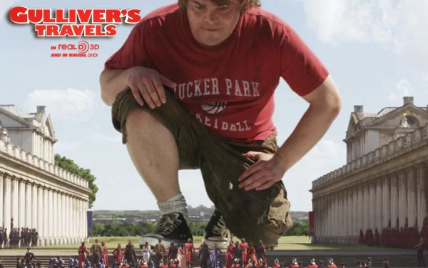 HD PC desktop wallpaper featuring a scene from the movie Gulliver’s Travels with the giant character crouching among miniature people in a cityscape.