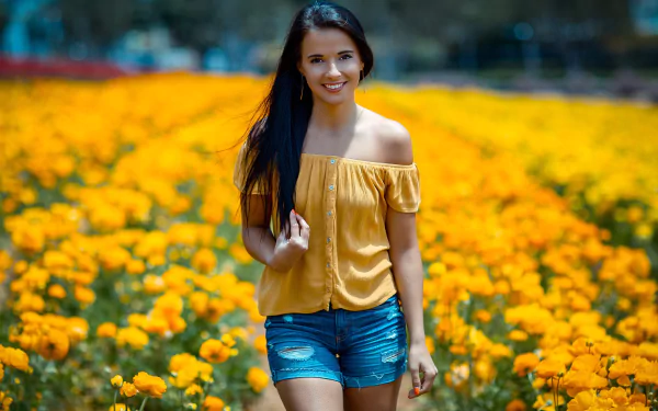 brown eyes black hair smile shorts yellow flower flower depth of field woman model HD Desktop Wallpaper | Background Image